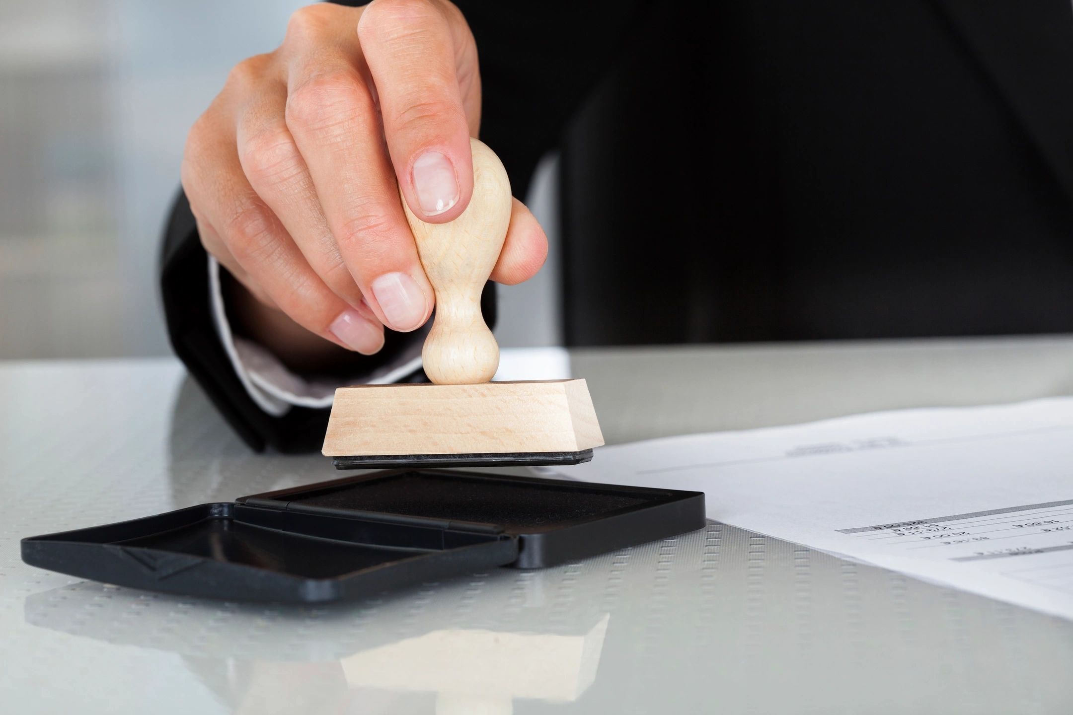 Rubber stamp approving official document
